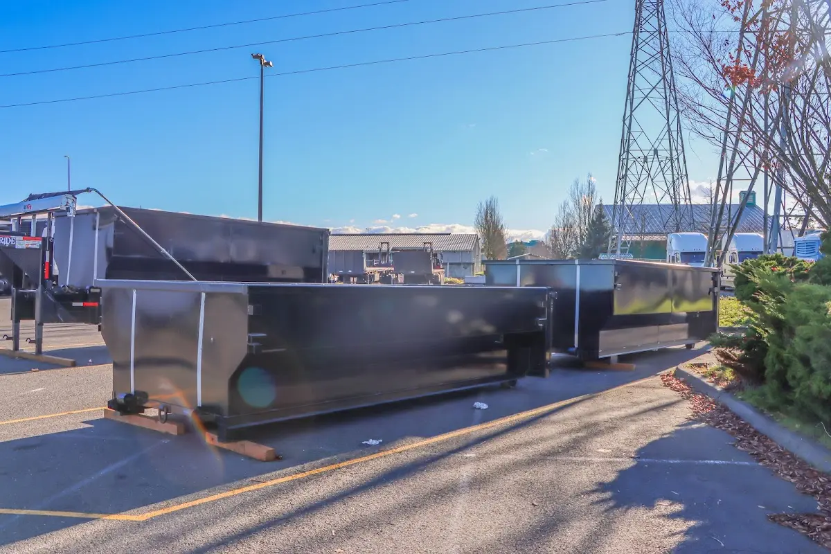 Roll-off dumpster ready for waste disposal at job site for 2 Yard Dumpster Rental in Porterville